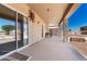 Spacious covered patio with access to the home via sliding glass doors at 10539 W Tamara Dr, Casa Grande, AZ 85193