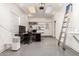 Versatile garage with an office setup and ample storage, perfect for a home business at 10539 W Tamara Dr, Casa Grande, AZ 85193