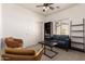 Spacious living room with sofa, chairs, coffee table and natural light from large window at 10539 W Tamara Dr, Casa Grande, AZ 85193