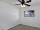 Simple bedroom features neutral colored walls, carpet and a window for natural light at 1059 E Broadmor Dr, Tempe, AZ 85282