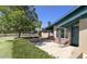 Exterior shot of the home with a well manicured yard and covered entrance at 1059 E Broadmor Dr, Tempe, AZ 85282
