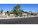 Street view of home with fence and low shrubbery at 1059 E Broadmor Dr, Tempe, AZ 85282