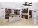 Spacious kitchen with granite counters, stainless appliances and tile flooring throughout at 1059 E Broadmor Dr, Tempe, AZ 85282