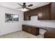 Spacious office area features built in desk space, upper and lower cabinets at 1059 E Broadmor Dr, Tempe, AZ 85282