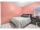 Comfortable bedroom featuring a full bed and a sleek, minimalist gray nightstand at 1060 W Dava Dr, Tempe, AZ 85283