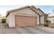 Tan single-Gathering home with tile roof and 2-car garage at 1060 W Dava Dr, Tempe, AZ 85283