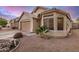 Well-maintained single-story home with a two-car garage and desert landscaping at 1060 W Dava Dr, Tempe, AZ 85283