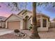 Charming single-story home with a two-car garage and beautiful desert landscaping at 1060 W Dava Dr, Tempe, AZ 85283