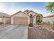 Charming single-story home with a two-car garage and beautiful desert landscaping at 1060 W Dava Dr, Tempe, AZ 85283
