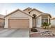 Charming single-story home with a two-car garage and beautiful desert landscaping at 1060 W Dava Dr, Tempe, AZ 85283