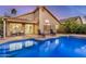 A private backyard swimming pool with lounge chairs on a concrete patio at 1060 W Dava Dr, Tempe, AZ 85283