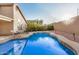 Backyard swimming pool with patio area that backs up to a block wall at 1060 W Dava Dr, Tempe, AZ 85283