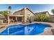 Beautiful backyard with swimming pool and lounge chairs that's perfect for entertaining at 1060 W Dava Dr, Tempe, AZ 85283