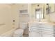 Bathroom featuring a shower/tub combo, toilet and vanity with marble countertop at 11627 S Iroquois Dr, Phoenix, AZ 85044