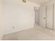 Bedroom featuring neutral carpet, light walls, a ceiling vent and closet doors at 11627 S Iroquois Dr, Phoenix, AZ 85044