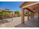 Enjoyable backyard featuring a covered patio, spacious sitting area, and lush landscaping for outdoor relaxation at 12029 W Overlin Ln, Avondale, AZ 85323