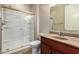 Bathroom featuring a walk-in shower and vanity at 12029 W Overlin Ln, Avondale, AZ 85323