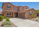 Charming two-story home with a spacious driveway and well-maintained landscaping at 12029 W Overlin Ln, Avondale, AZ 85323