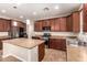 Functional kitchen with a central island, perfect for meal preparation and entertaining at 12029 W Overlin Ln, Avondale, AZ 85323