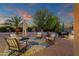 Inviting backyard patio with comfortable seating, perfect for outdoor entertaining and relaxation at 14267 W Crocus Dr, Surprise, AZ 85379
