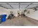 Spacious garage with ample storage and room for multiple vehicles or hobbies at 14267 W Crocus Dr, Surprise, AZ 85379