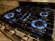 Close up of a modern stainless steel gas cooktop at 14267 W Crocus Dr, Surprise, AZ 85379