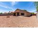 Backyard featuring a fire pit and ample space for outdoor activities at 16147 W Central St, Surprise, AZ 85374