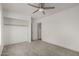 Bright, carpeted bedroom with closet space and a neutral color scheme at 16147 W Central St, Surprise, AZ 85374