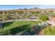 Community park with playground, native vegetation and mountain views at 17562 W Desert Sage Dr, Goodyear, AZ 85338