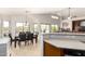 Open floor plan showcases dining room with backyard views at 17562 W Desert Sage Dr, Goodyear, AZ 85338