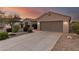 Lovely single-story home with a private driveway and a well-kept desert landscape for easy maintenance at 17562 W Desert Sage Dr, Goodyear, AZ 85338
