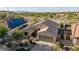 Inviting single-story home with desert landscaping, neutral color palette, tile roof, and two car garage at 17562 W Desert Sage Dr, Goodyear, AZ 85338