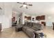 Open-concept living room offers a spacious seating area, seamlessly connecting to the kitchen for easy entertaining at 17562 W Desert Sage Dr, Goodyear, AZ 85338