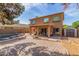 View of the home's backyard, outdoor seating and water feature at 17851 W Calavar Rd, Surprise, AZ 85388