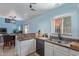 Well-equipped kitchen with views to the dining area and a modern sink at 17851 W Calavar Rd, Surprise, AZ 85388