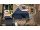 Aerial view of a beautifully landscaped property, highlighting the home, pool, and surrounding area at 18125 W Montebello Ct # 67, Litchfield Park, AZ 85340
