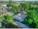 Aerial view of a house with well-kept lawn and mature trees at 1886 S 141St Pl, Gilbert, AZ 85295