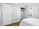 Bright bedroom featuring closet, and a window with natural light at 1886 S 141St Pl, Gilbert, AZ 85295
