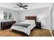 Bedroom includes a bed, two side tables and dresser, plus a closet at 1886 S 141St Pl, Gilbert, AZ 85295