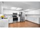 Stylish kitchen features stainless steel appliances, white cabinetry, and modern countertops at 1886 S 141St Pl, Gilbert, AZ 85295