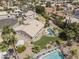 Aerial view of a home with a private pool, manicured landscaping, and a desert neighborhood at 19010 N 35Th Way, Phoenix, AZ 85050