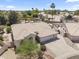 Aerial view of the home features well-maintained landscaping and a three-car garage at 19010 N 35Th Way, Phoenix, AZ 85050
