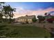 Picturesque backyard featuring a pool, lush landscaping, and inviting outdoor space at 19010 N 35Th Way, Phoenix, AZ 85050