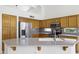 Well-equipped kitchen featuring stainless steel appliances and ample granite counter space at 19010 N 35Th Way, Phoenix, AZ 85050
