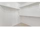Walk-in closet with built-in shelving and rod hangers at 19010 N 35Th Way, Phoenix, AZ 85050