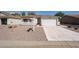 Charming single-story home with a two-car garage and low maintenance desert landscaping at 1920 E Westchester Dr, Chandler, AZ 85249