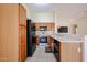 Well-appointed kitchen with stainless steel appliances and ample cabinet space at 1920 E Westchester Dr, Chandler, AZ 85249