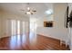 Spacious living area with vaulted ceilings, laminate flooring, and natural light at 1920 E Westchester Dr, Chandler, AZ 85249