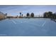 Community tennis courts with blue surface and white lines, surrounded by fencing at 1920 E Westchester Dr, Chandler, AZ 85249