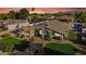 Expansive aerial view showcases the home's prime location, manicured lawn, and inviting outdoor spaces at 19903 E Augustus Ave, Queen Creek, AZ 85142